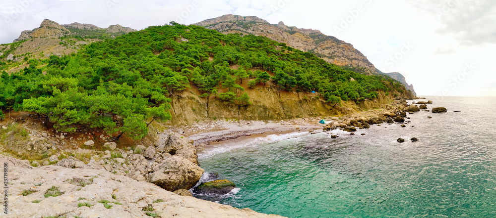 Camping with tents on the beach figs , Balaklava and Cape Aya are unveiled .Crimea.