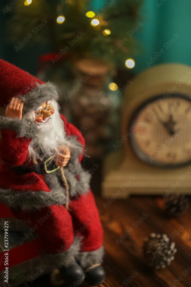 Toy Santa Claus with gifts and Christmas Decorations