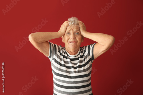 Portrait of elderly woman a...