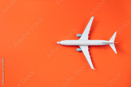 Image of airplane isolated on empty red background