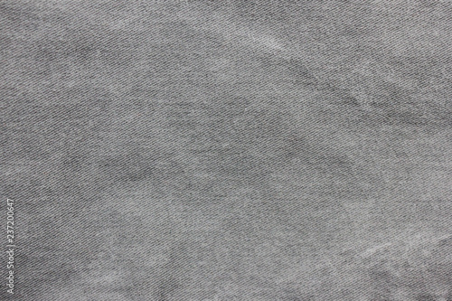 Pale Grey Denim Jean Texture Background Image. Empty Casual Clothes Fabric, Seamless Washed Out Jeans Pattern. Blank Wallpaper Design with Selective Focus to Use as Template, Mock Up, Layout or Banner
