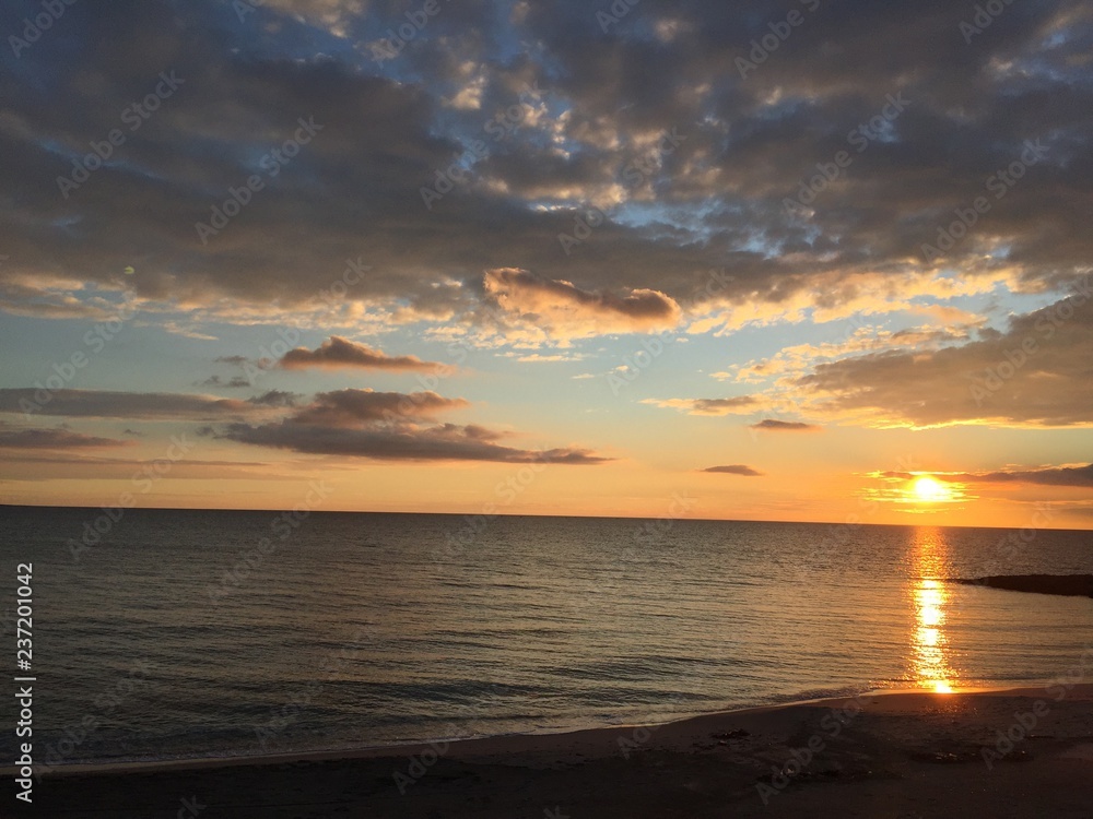 Obraz premium Mare con tramonto