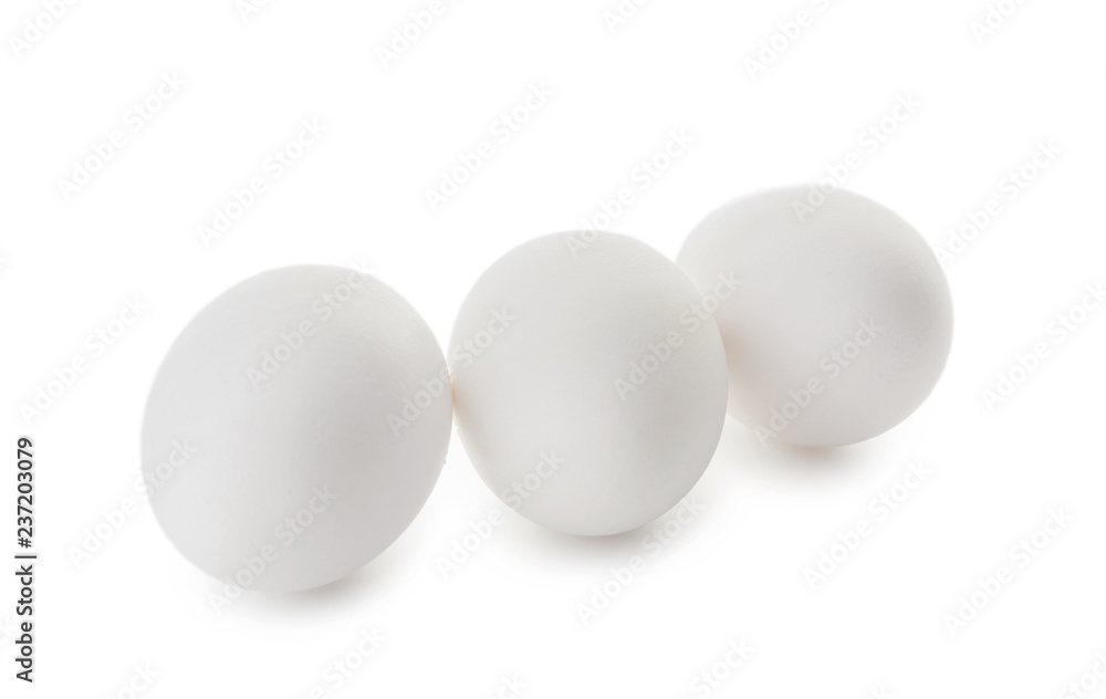 Raw chicken eggs on white background