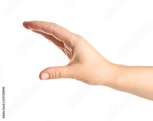 Female hand holding something on white background