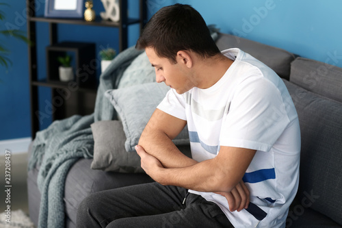 Young man suffering from pa...