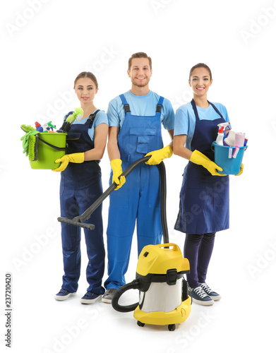 People with cleaning supplies on white background