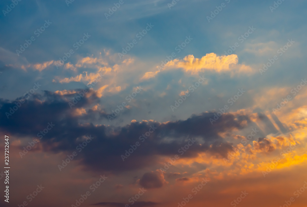Fototapeta premium Sky and clouds reflected sunset light.