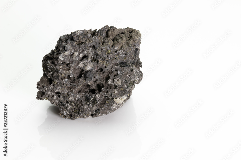 Lava is molten rock generated by geothermal energy and expelled through fractures in planetary crust or in an eruption, from Vesuvius volcano, isolated on a white background, Naples, Italy Lava is molten rock generated by geothermal energy and expelled through fractures in planetary crust or in an eruption, from Vesuvius volcano, isolated on a white background, Naples, Italy