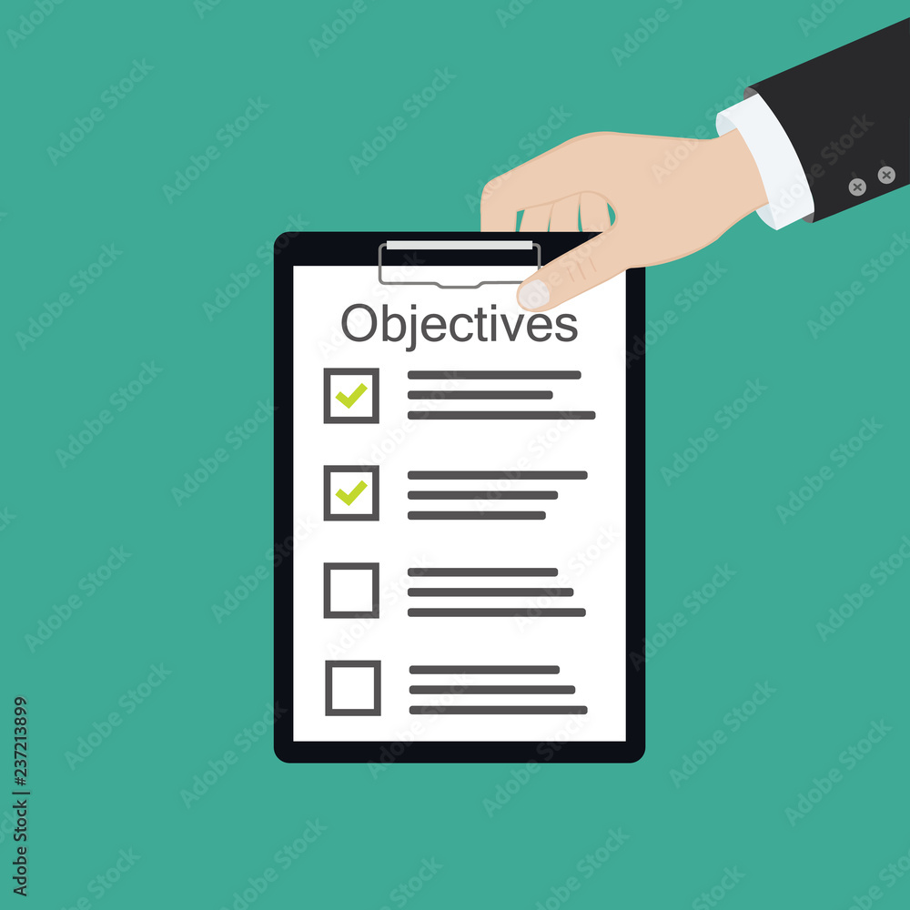 In hand. Objective board goal check list In hand. Objective board goal check list