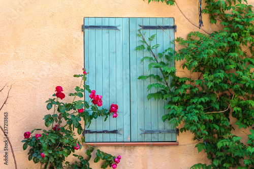 Lurs France. 15 september 2018. Window with closed shutters and flowers at the village of Lurs in Provence France.