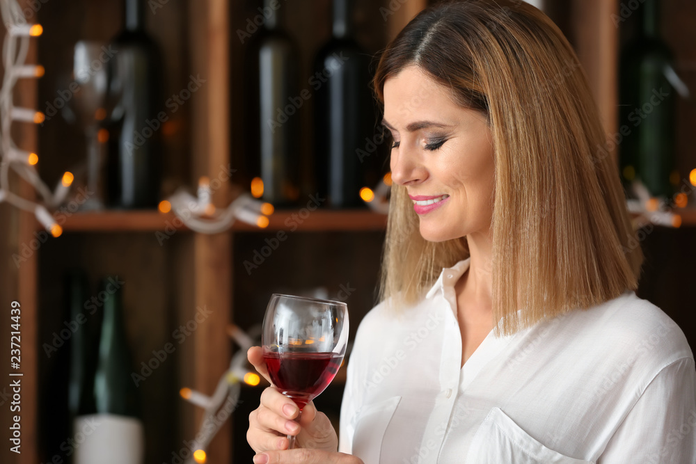 Smiling woman with glass of tasty wine in bar Smiling woman with glass of tasty wine in bar