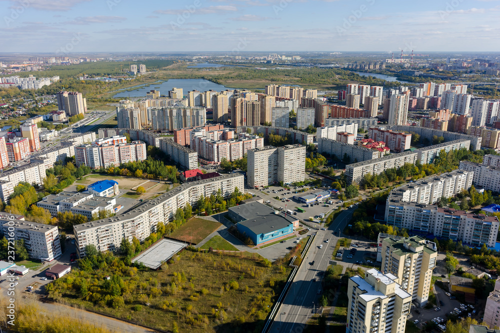 Tyumen, Russia - September 26, 2017: Aerial view onto 1st Zarechny residential district and Zdorovye fitness complex