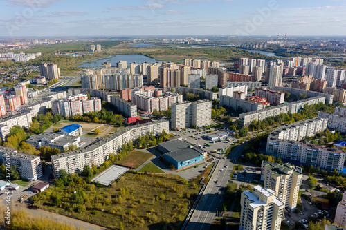 Tyumen, Russia - September 26, 2017: Aerial view onto 1st Zarechny residential district and Zdorovye fitness complex