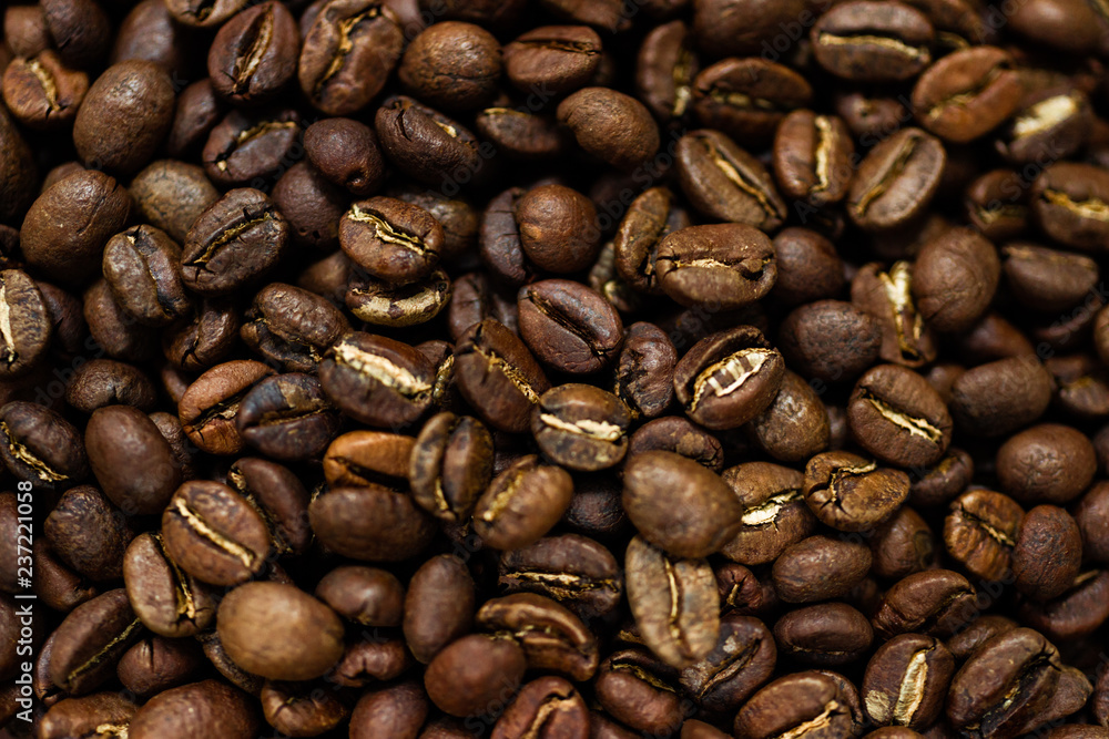 Fototapeta premium Fresh roasted Arabica coffee beans. Great backgroung. Good for wallpapers or photobackground.