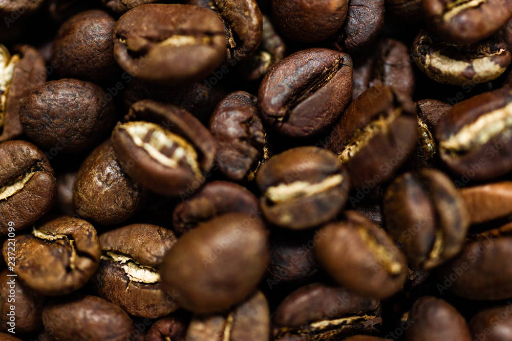 Fresh roasted Arabica coffee beans. Great backgroung. Good for wallpapers or photobackground. Fresh roasted Arabica coffee beans. Great backgroung. Good for wallpapers or photobackground.