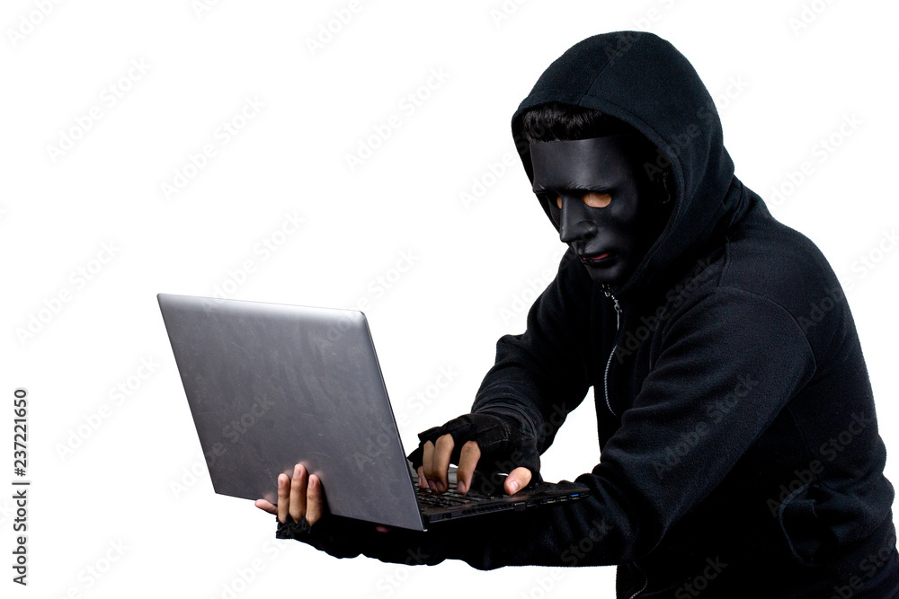 Hacker using laptop Hacker using laptop