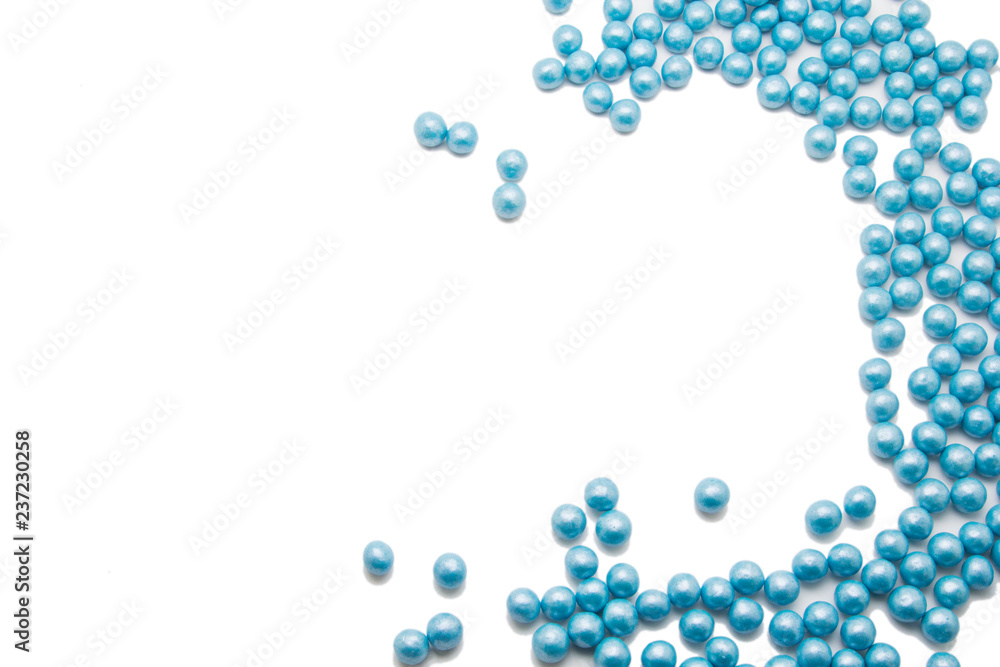 Multi-colored pearls on a white background Multi-colored pearls on a white background