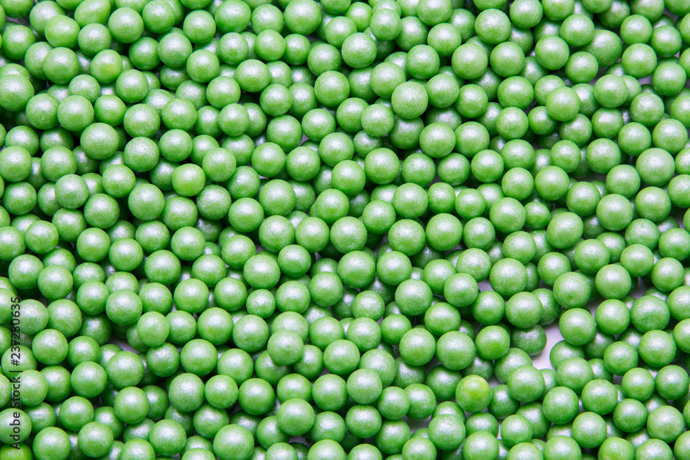 Multi-colored pearls on a white background Multi-colored pearls on a white background