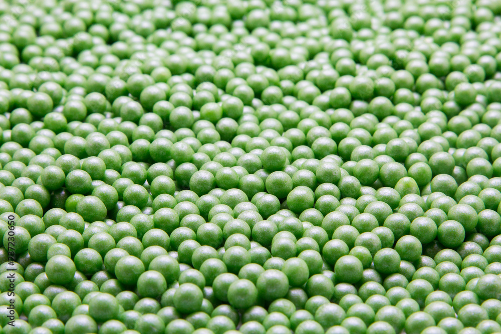 Multi-colored pearls on a white background Multi-colored pearls on a white background