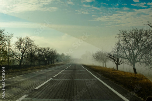 fog road through the windshield