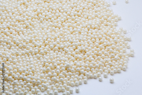 Multi-colored pearls on a white background