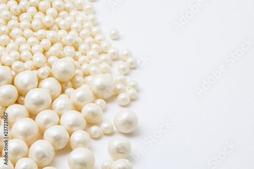 Multi-colored pearls on a white background