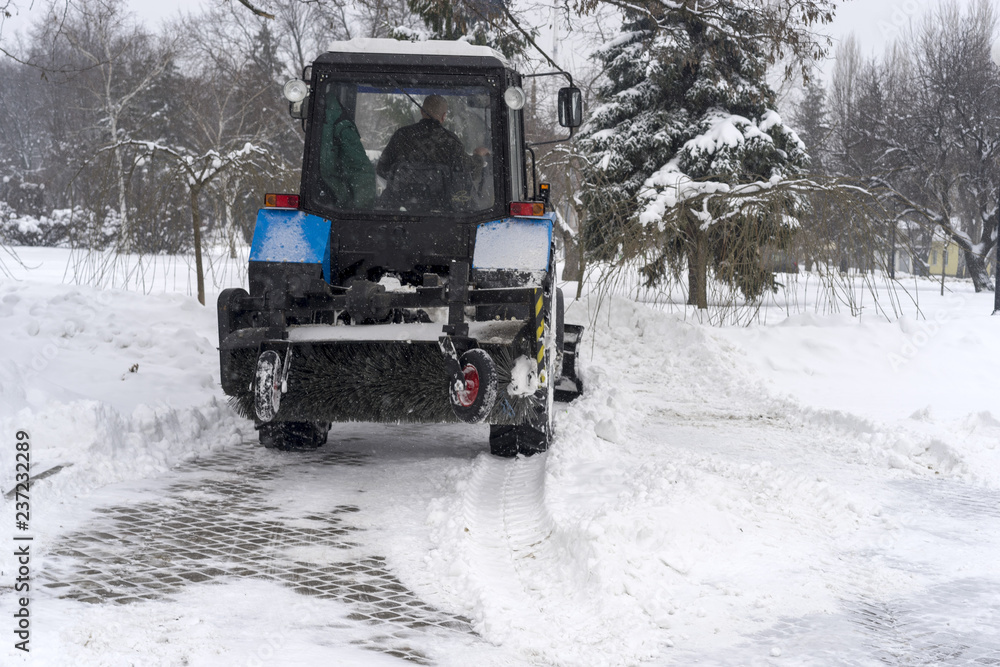 covered with snow, snow removal equipment on the streets to clean covered with snow, snow removal equipment on the streets to clean