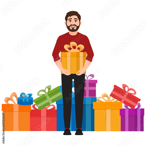 A man holds a gift, a lot of gifts in the background, happy man