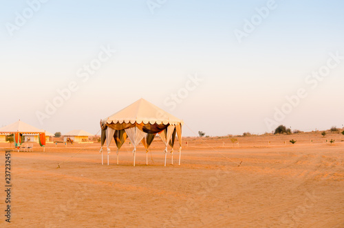 Swiss tents on sand in the desert of sum near jaisalmer rajasthan india. This popular tourist activity is a vacation staple with camping under stars in thar desert