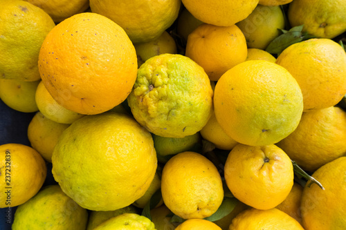 Fresh orange stand at a street organic food market.