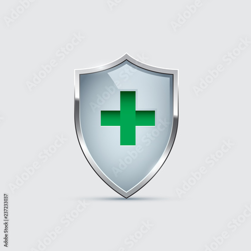 Glass Shield with silver frame and Green Cross isolated on gray. Vector Health Protection icon.