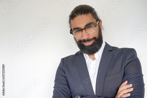 Hipster style businessman standing on white background © goodluz