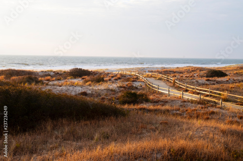 Walkway to beach at sunrise