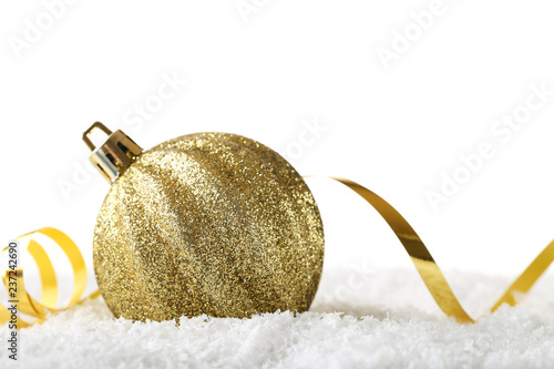 Golden christmas bauble with ribbon on white background