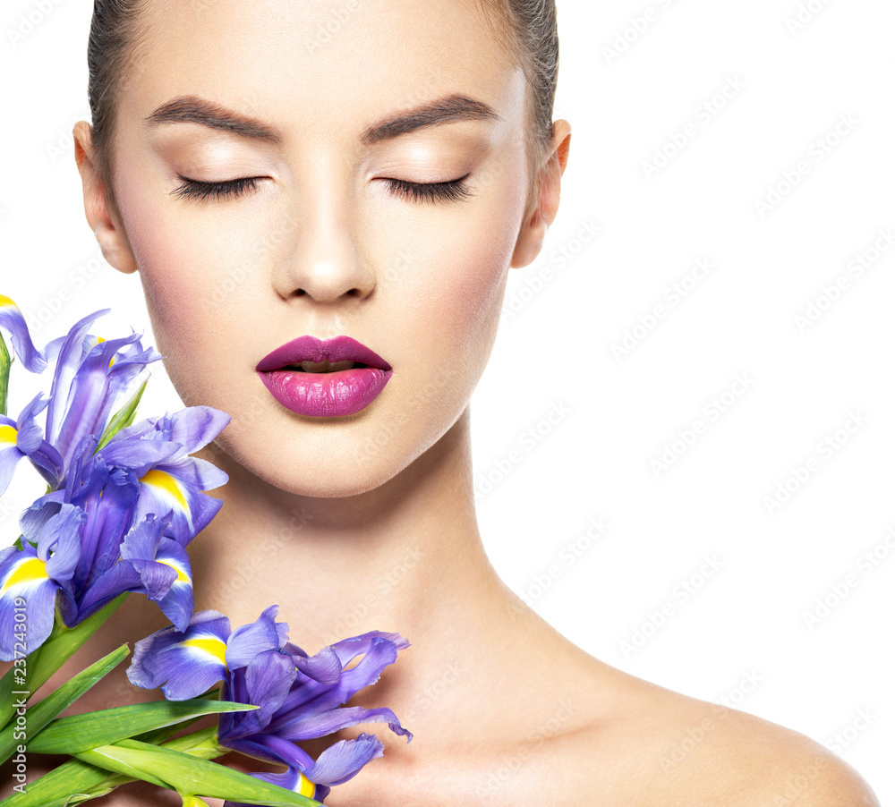 Portrait of young beautiful woman with a healthy clean skin of the face Portrait of young beautiful woman with a healthy clean skin of the face