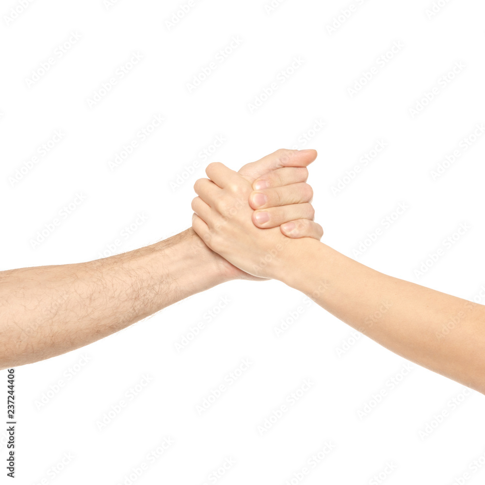 Two hands holding each other strongly on white background isolation