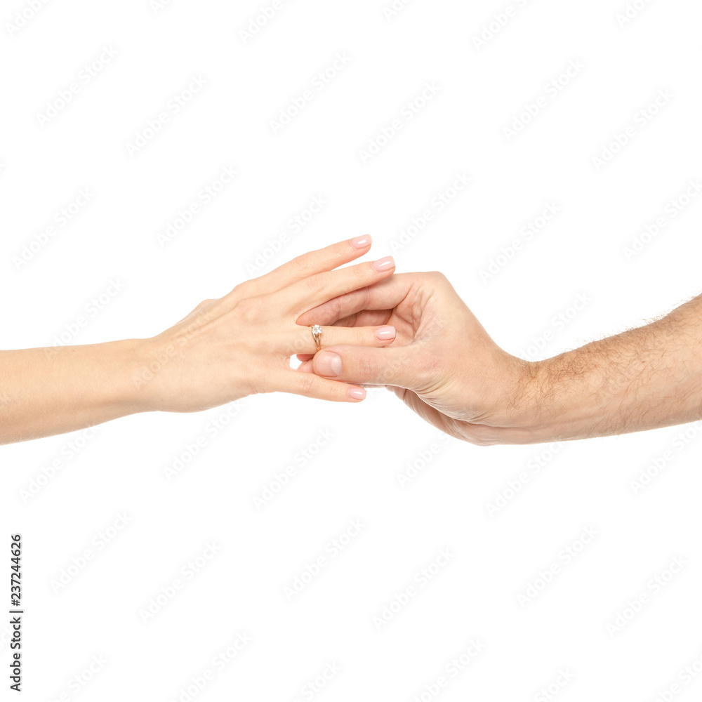 Couple hands male and female ring proposal on white background isolation Couple hands male and female ring proposal on white background isolation