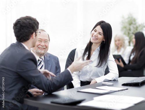 Wallpaper Mural project Manager and staff talking at the Desk Torontodigital.ca