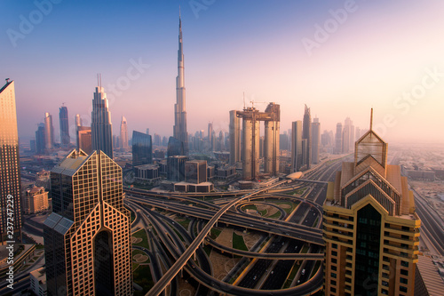 Dubai skyline at sunset, aerial top view to downtown city center landmarks. Famous viewpoint, United Arab Emirates