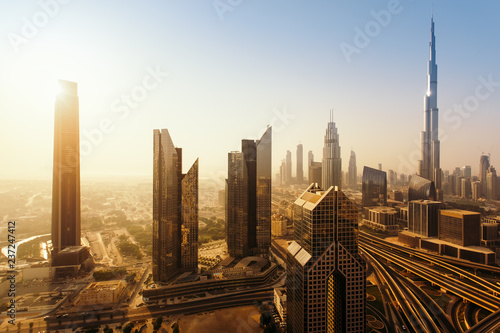 Dubai skyline in the morning, aerial top view to downtown city center landmarks at sunrise. Famous viewpoint, United Arab Emirates