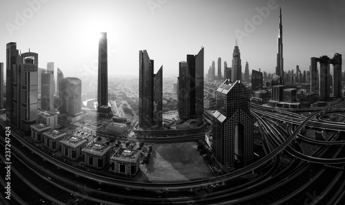 Photography Dubai skyline in the morning, panoramic aerial top view to downtown city center landmarks at sunrise