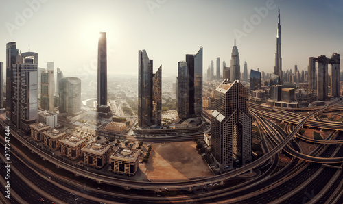 Dubai skyline in the morning, panoramic aerial top view to downtown city center landmarks at sunrise. Famous viewpoint, United Arab Emirates