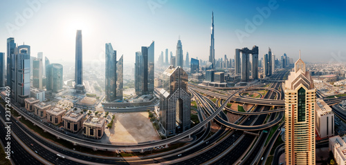 Dubai skyline in the morning, panoramic aerial top view to downtown city center landmarks at sunrise. Famous viewpoint, United Arab Emirates photo