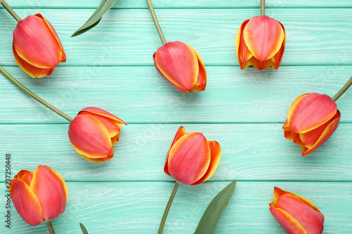 Bouquet of tulips on mint wooden table