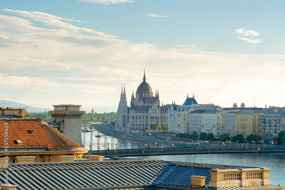 Fototapeta premium View of Budapest city. Hungarian parliament over roofs