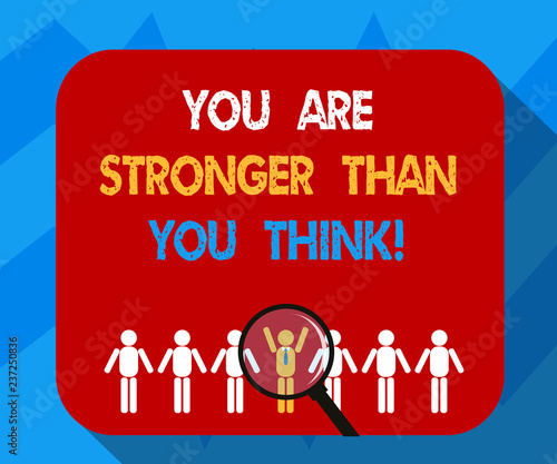 Text sign showing You Are Stronger Than You Think. Conceptual photo Adaptability Strength to overcome obstacles Magnifying Glass Over Chosen Man Figure Among the Hu analysis Dummies Line Up