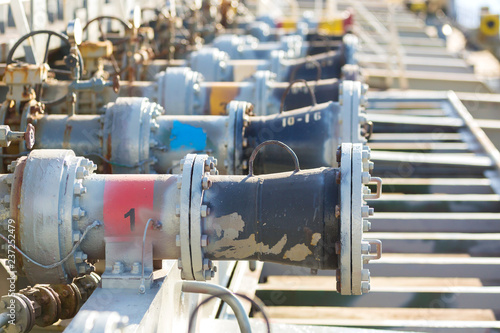 Cargo manifolds valves of an oil product tanker.