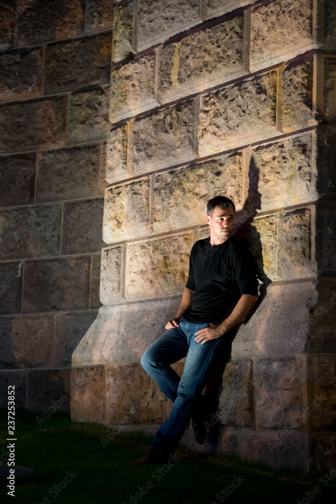 Australian man poses for picture in Brisbane, Australia. Brisbane is one of the Australia's tourist destination points. Australian man poses for picture in Brisbane, Australia. Brisbane is one of the Australia's tourist destination points.