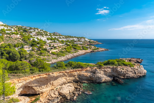 Ibiza island, seascape of the ocean, and typical houses on the coast