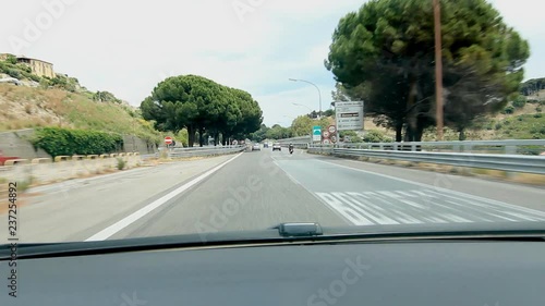 SICILY, ITALY on MAY 25th: Sign for Palermo and Messina in Sicily, Italy on May 25th, 2015.  Driving on AutoStrada A18 in Sicily.  photo